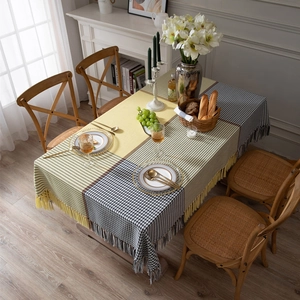 Modern thick rectangular tablecloth with yellow, houndstooth, and stripe patchwork details