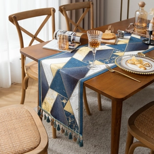 Luxury geometric jacquard table runner with blue gold diamonds and elegant tassels