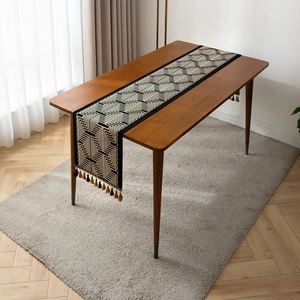 Retro geometric jacquard table runner with tassels and blue yellow labyrinth patterns