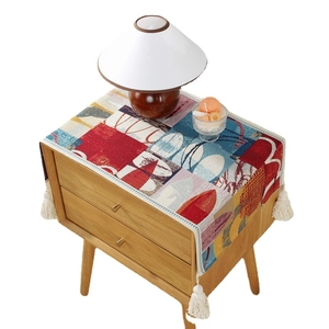 Abstract geometric jacquard dust cover with tassels for bedside table and furniture