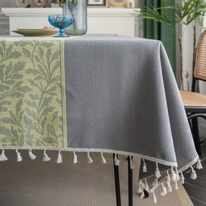 Gray and green leaf jacquard tablecloth with white tassel trim for home dining tables