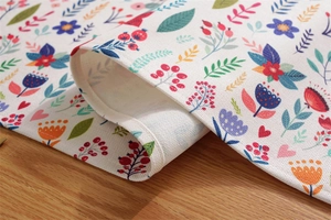 Close-up detail of thickened polyester-cotton Easter floral table runner fabric texture