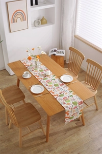 Detail of Easter table runner featuring forest animals and Happy Easter text