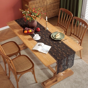 Elegant black lace table runner with rose floral hollow design on wooden dining table