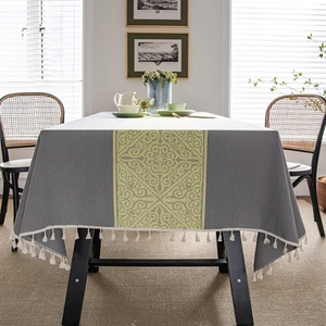 Modern gray jacquard tablecloth with yellow vintage patterns and white tassels