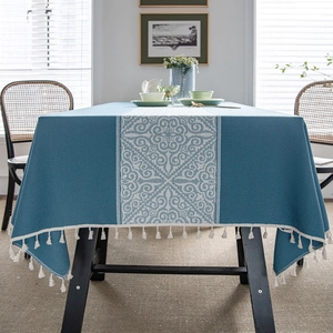 Navy blue jacquard rectangular tablecloth with white ethnic pattern and tassel fringes