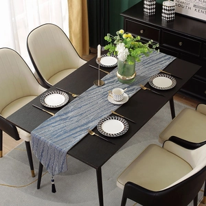 Modern luxury jacquard table runner with blue feather patterns and tassel decor
