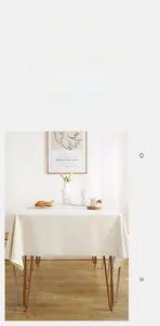 Detail of soft cream faux leather table mat with lambskin texture and waterproof finish