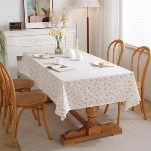 French country style floral cotton tablecloth on wooden table with vintage tea set