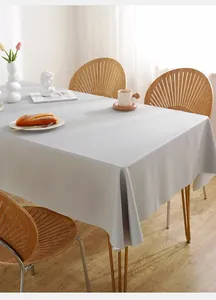 Close-up of premium waterproof PVC tablecloth in light grey with elegant drape