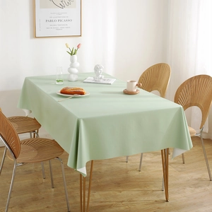 Waterproof mint green PVC rectangular tablecloth for a modern minimalist dining room