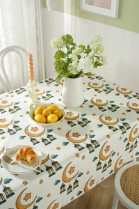 Detailed pattern of yellow crescents and lanterns on waterproof polyester tablecloth