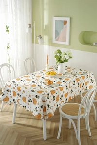 Detail of polyester tablecloth with printed stars, moon, and lanterns for Ramadan decor