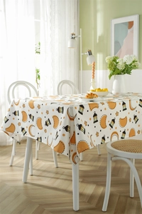 Close-up of waterproof polyester tablecloth with star, moon and lantern patterns