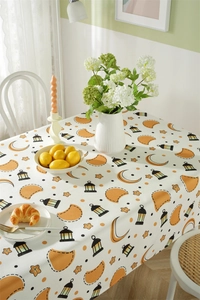 Close-up of a waterproof polyester tablecloth featuring Ramadan moon and lantern patterns