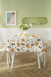 Close-up of star and moon printed waterproof polyester tablecloth for Eid dining decor