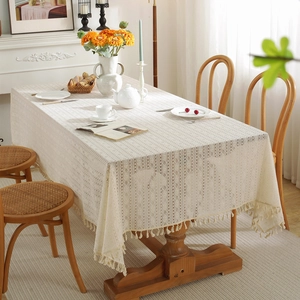 Beige lace tablecloth with geometric hollow patterns and tassels for vintage wedding decor