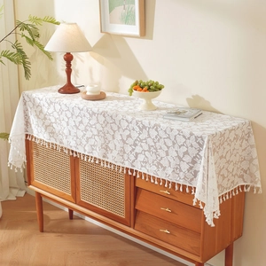 White French lace table runner with leaf patterns and elegant tassels for sideboard decor