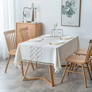 Rectangle cream tablecloth with brown geometric patterns and tassel edges in Nordic style