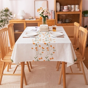 Modern minimalist tablecloth with orange tulip digital print on off-white linen fabric