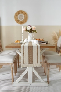 Detailed texture of cotton linen table runner with vertical stripes and dense tassels