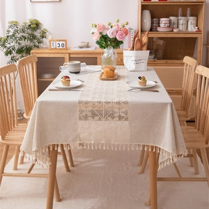 Linen cotton tablecloth featuring elegant hollow lace patchwork and cream tassel edges