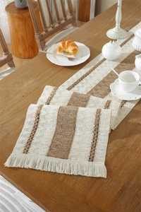 Close-up of American style woven cotton linen table runner with fringes and stripes