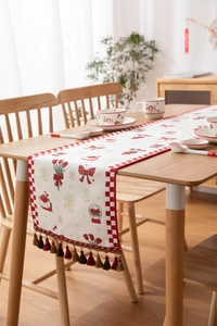 Bruiloft tafelloper met bloemenprints, rode strikken en decoratieve franjes