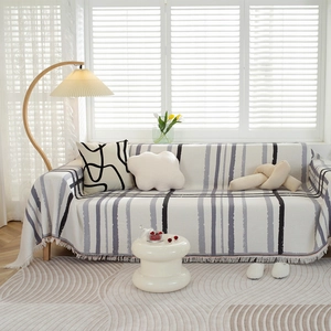 Modern Nordic gray waffle weave sofa cover with geometric fringe trim for living room