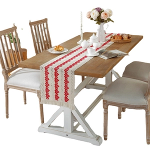 Ethnic cotton linen table runner with red geometric patterns and handmade tassels