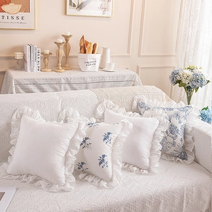 French romantic cotton pillowcases with ruffle edges and blue floral embroidery details