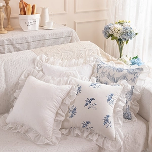 Detail of French ruffle edges and embroidery on high-quality cotton pillowcases