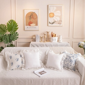 Detailed ruffled edges and floral patterns on romantic cotton ruffle cushion covers