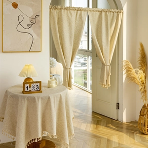 Beige linen door curtain and tablecloth set with fringe trim for cozy home decor