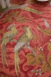 Detailed close-up of retro floral canvas tablecloth with phoenix and paisley patterns