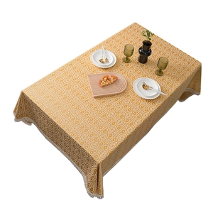 Mantel geométrico bohemio amarillo y blanco con borlas para mesas de comedor rectangulares