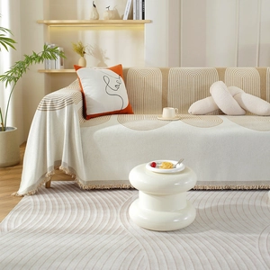 Housse de canapé en chenille nordique avec motifs géométriques et pompons de franges