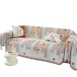 Nordic chenille sofa cover with woven stripes and star patterns featuring fringe edges