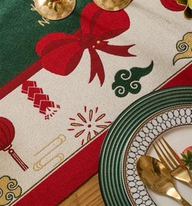 Detailed macro view of woven jacquard fabric with festive holiday patterns and gold thread