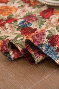 Detail of vintage floral jacquard table runner fabric with thick cotton weaving