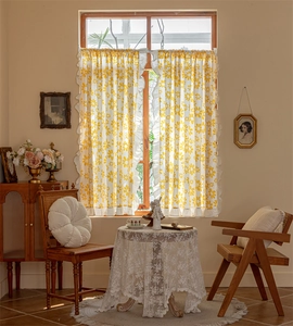 Detail of yellow daisy floral cafe curtain with elegant double ruffled edge design