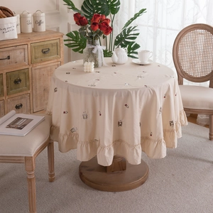 Beige cotton round tablecloth with animal embroidery and ruffled hem for dining tables