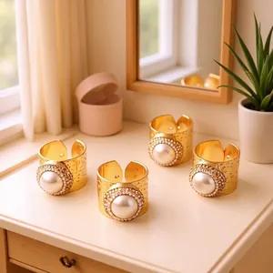 Gold wide-band open bracelet set with large natural pearl and sparkling rhinestones