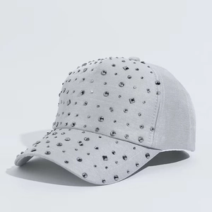 Detailed view of grey baseball cap featuring premium silver rhinestone embellishments