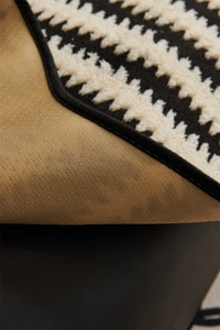 Close-up of jacquard sofa cushion featuring plush texture and non-slip dotted backing