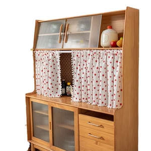 Wooden kitchen sideboard with reed glass doors and floral pattern cafe curtain