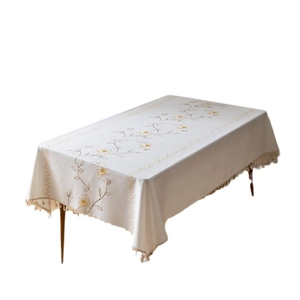 Rectangular cream tablecloth with yellow floral embroidery and fringe tassels