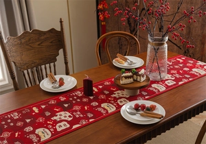 Detail of red festive table runner with golden jacquard embroidery and Fu characters