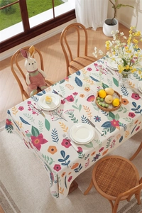 Close-up of Easter rectangular tablecloth with floral patterns and fringe details