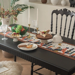 Detailed embroidery of stars and moon jacquard on a bohemian style table runner